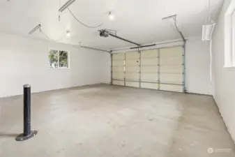 Newly painted garage. Walls are taped, textured and painted.