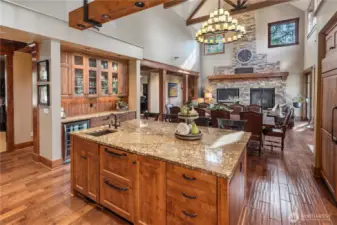 Two large drawers in the island... cabinet door matched beverage refrigerators!