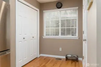 Pantry on left, half bath on right.