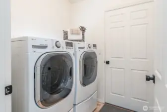 Main floor laundry. One of two laundry rooms.