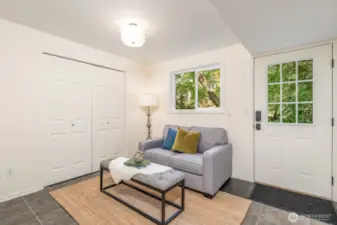 Lower level entry can easily function as living/den/dining if turning lower level into a MIL-suite.