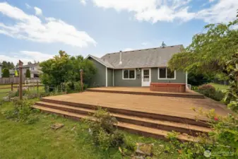 Big deck, bigger vibes. Full-length steps lead you to plenty of room for outdoor dining, lounging, and maybe even that grill master showdown you’ve been dreaming of. Bonus: storm/screen door keeps bugs out but lets fresh air in.
