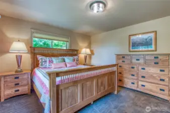 Lower level has two bedrooms flanking a full bath.