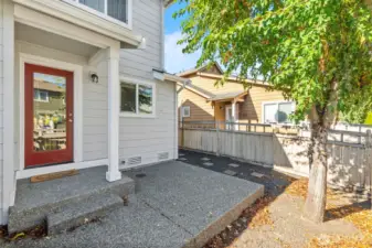 Fully fenced backyard with patio