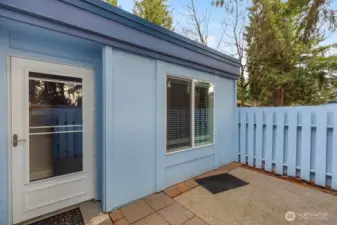 Entryway with newer front door.