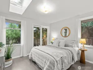 At the end of the hall is the 2nd bedroom with access to the backyard.