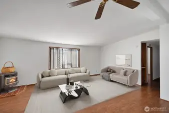 Another view of the formal living room area. Get a sense of the size and how much furniture it will easily accommodate. Virtually staged.