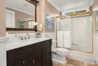 Perfect updated full bath, heated floors and laundry area.