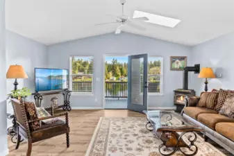 A cozy gas fireplace keeps the entire home warm and toasty in cooler months with wall heaters strategically placed as well. Step out to the expansive deck for serene views, a stunning sunrise with your morning coffee or a family of deer peacefully passing through.