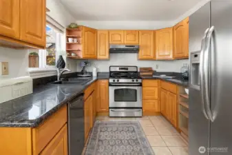 Great counterspace and an abundance of storage await your creative culinary dishes.