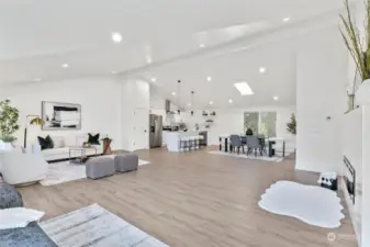 Living room with vaulted ceilings.