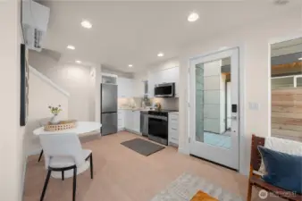 Photos of model home with similar finishes & floor plan.