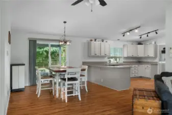 Open concept with eat-in and dining room options.