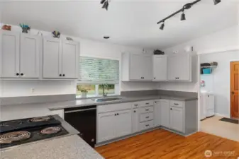Clean, simple, and stylish—this kitchen is ready for cooking, gathering, and everyday life.