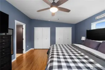 Large primary bedroom has 2 extra-large closet spaces.