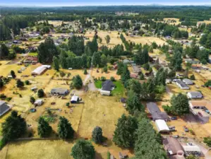 A beautiful aerial view showcasing large lots, tree-lined streets, and peaceful surroundings.