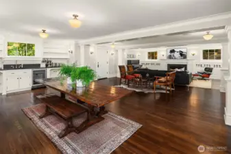 Great room located in the fully finished 2080sf lower level. 8'5" ceilings with period finishes to echo the theme of the home.