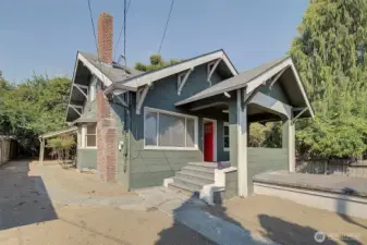 Sweet home perched above the street.