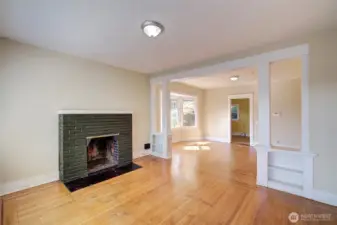 Look at those gorgeous built ins between the living and dining room.