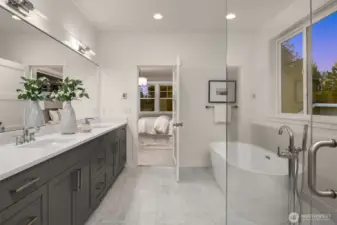 Primary Suite bath features heated tile floors.