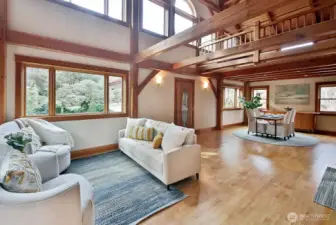 The great room offers an inviting central space combining the living, dining, and kitchen areas in a beautifully open floorplan. This is an amazing place to entertain guests.