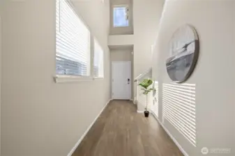 Welcoming entry and staircase create a clean transition into the main living areas