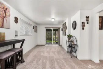 Even more space in the downstairs. Slider out to hot tub and backyard.