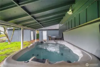 Private hot tub with covered patio
