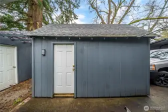 TWO large sheds – one ideal for workshop use