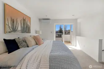 This top-floor retreat perfectly balances indoor luxury with an outdoor escape, offering a quiet vantage point high above the neighborhood.