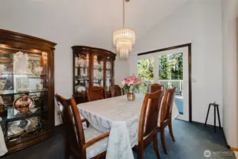 Formal dining room, leads you to the large TREX deck that over looks a beautiful yard.