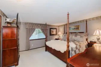 Large primary suite. Pictured is a CAL KING bed.