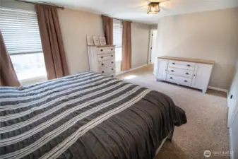 The primary suite is spacious & relaxing.