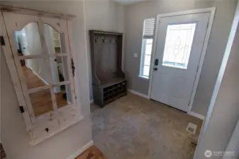 The entry is spacious and flows into the beautiful living room!