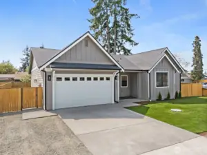 Nestled on a large corner lot with No HOA! Beautiful landscaping and lots of room for parking.