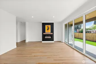 The Great room overlooks the backyard, Large sliders open to connect the outdoor covered patio to the Great room. Perfect for entertaining!