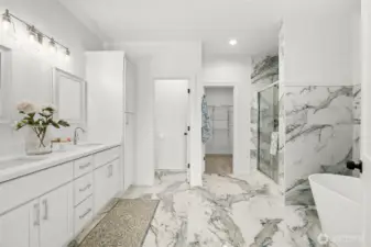 Gorgeous Private Primary Suite bathroom feels like you are at the Spa! Dual vanity, walk-in shower, freestanding soaking tub, water closet and walk-in closet. Stunning porcelain tile floors and walls compliment the cabinets.
