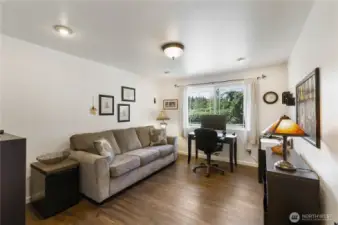 The bonus room is perfect for extra guests or a home office.
