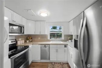 Kitchen with stainless steel appliances.