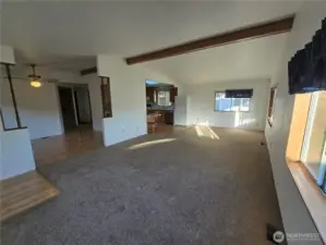 Spacious living room overlooks the kitchen & Dining room