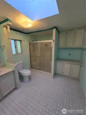 Attached Primary bathroom with separate vanity space
