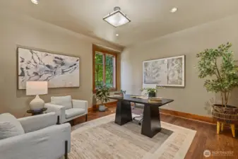 Spacious main-level executive office bathed in light, wired for high-speed internet, and ideal for inspired productivity.