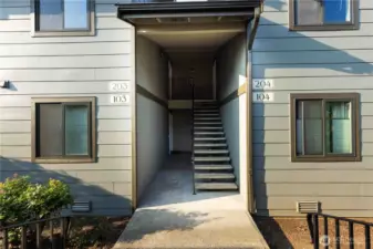 Unit 203 top left just a few steps from your covered parking spot