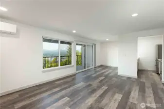 View from living room into dining and kitchen