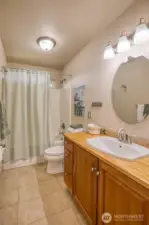 Guest bathroom featuring heated floors