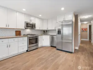 Large kitchen with stainless appliances included
