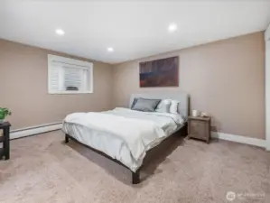 Spacious primary suite includes a private bath