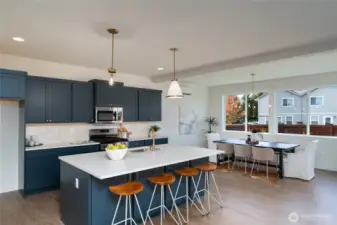 Kitchen - Pics are of a different 3049 plan. Features and colors may differ.