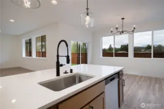 Kitchen - Pics are of a different 3049 plan. Features and colors may differ.