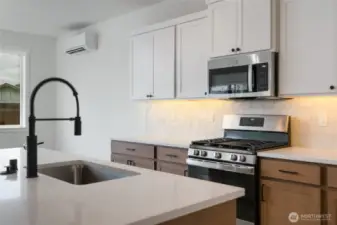 Kitchen - Pics are of a different 3049 plan. Features and colors may differ.